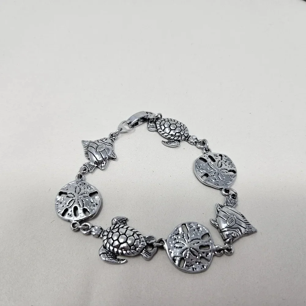 Sea life wrist bracelet Silver Tone Sea Turtle Sand Dollar Fish 7 In. Dolphin